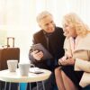 Elderly,Couple,In,The,Airport,Lounge.,They,Are,In,The