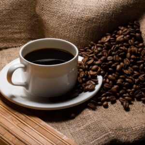 cup of coffee with coffee beans