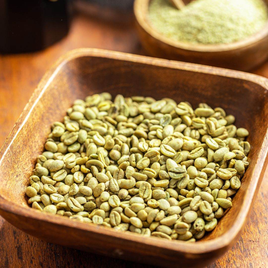 Unroasted coffee beans in a bowl