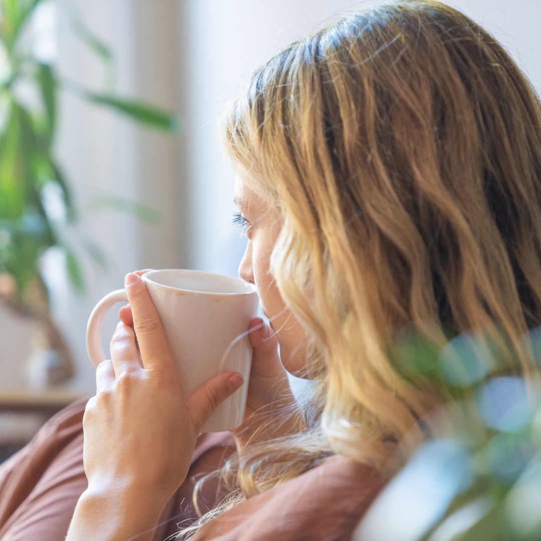 woman drinking coffee