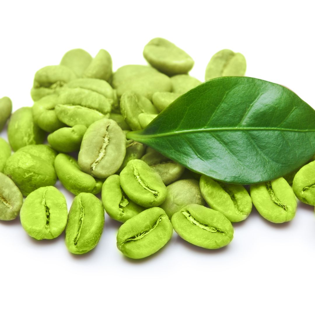 green coffee beans with leaf