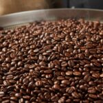 Professional photo of freshly roasted coffee beans cooling on a tray