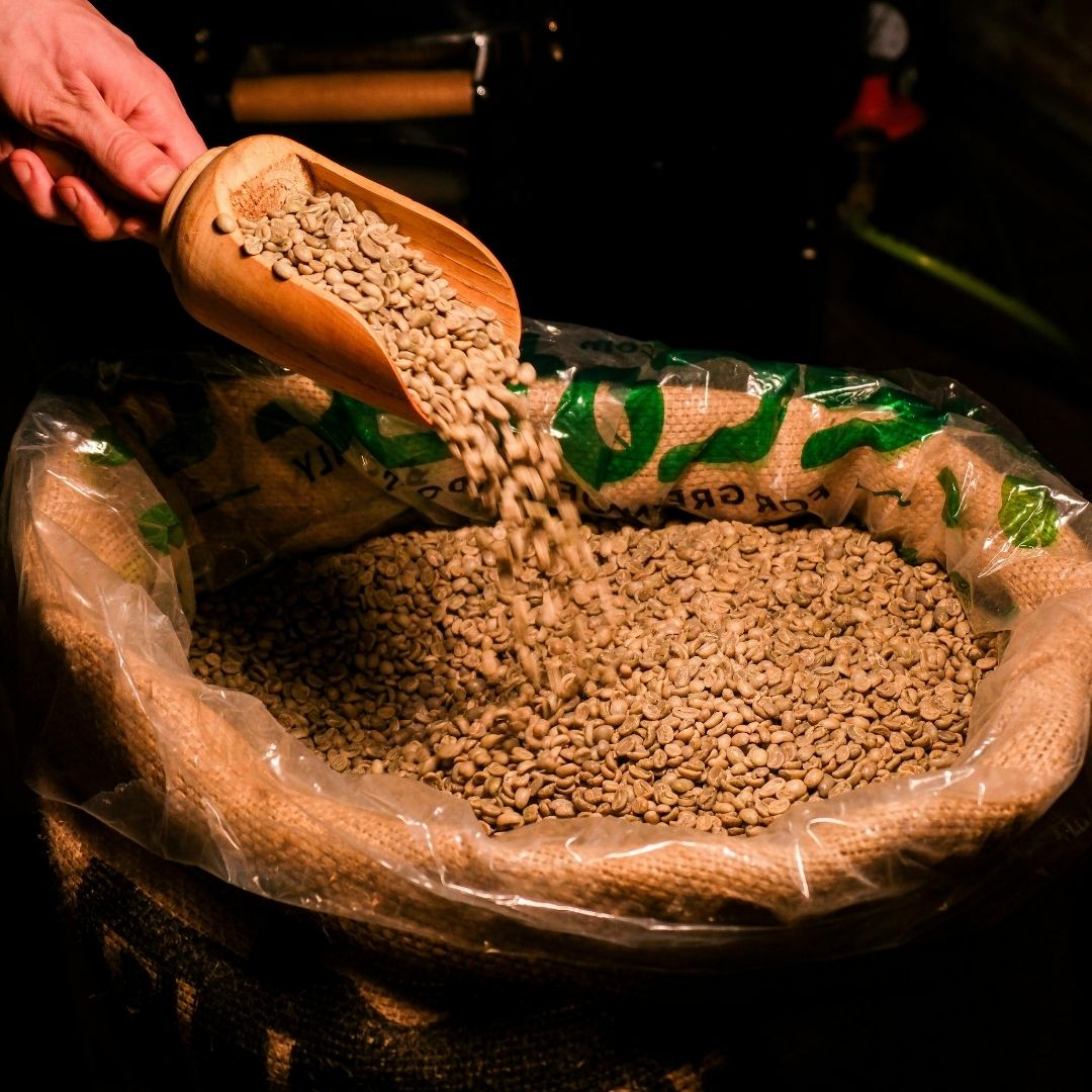 a bag of raw coffee beans